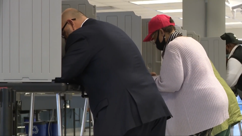 Voters in Ohio Using Language Support Services at A Polling Station