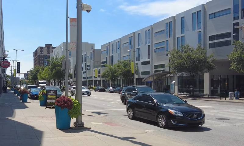 Street in Cleveland, beautiful day, cars passing by